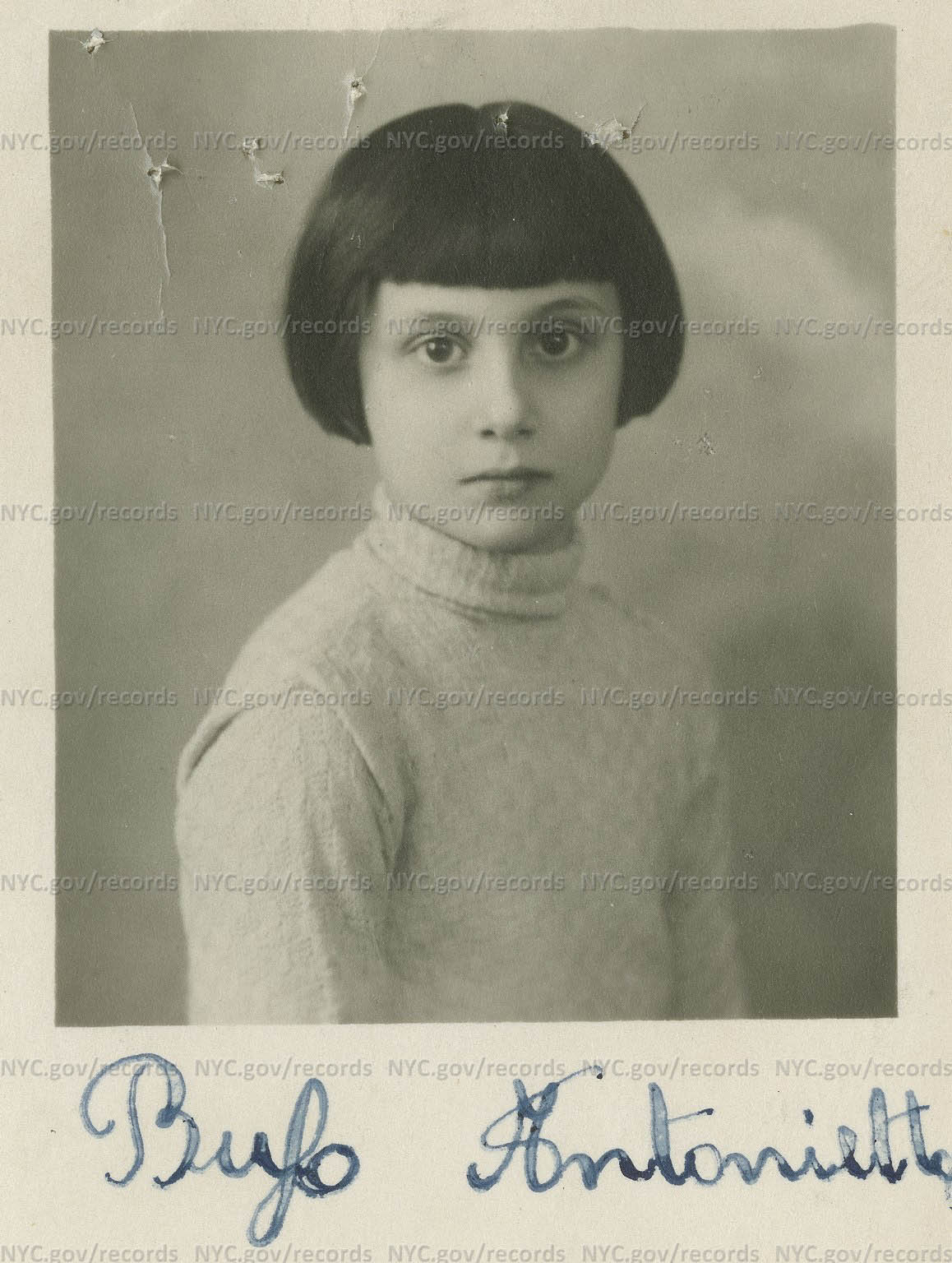Antonietta Bufo, portrait of young girl with bangs.